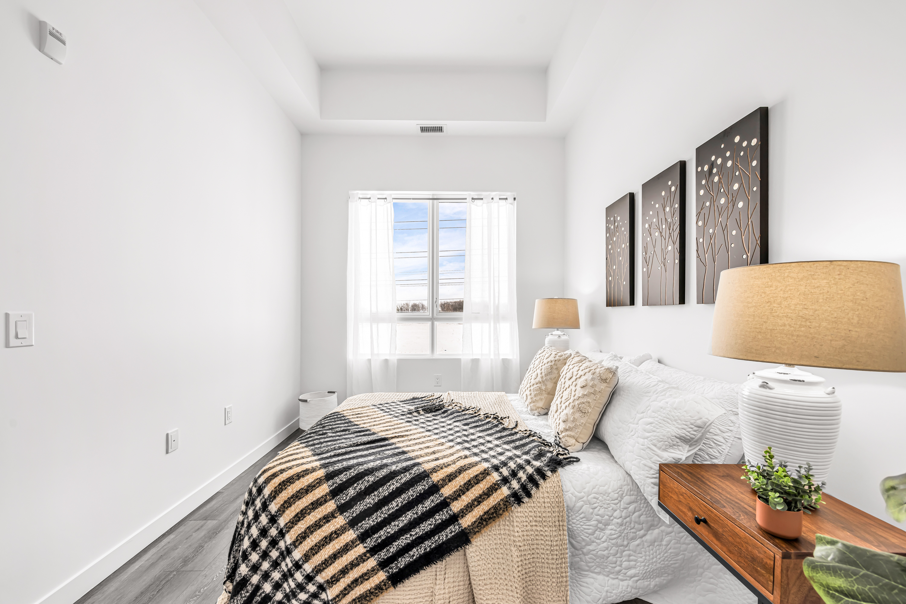 Marbella residence bedroom – bright, airy, with large window and natural light